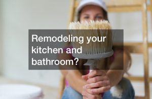 woman remodeling kitchen and bathroom holding brush
