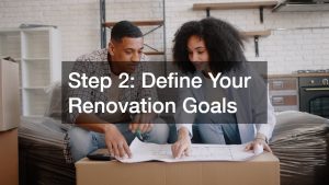 a couple looking at their renovation plan